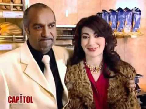 Pascal Légitimus dans le rôle d'un boulanger friqué, avec sa femme