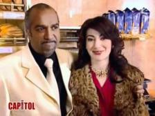 Pascal Légitimus dans le rôle d'un boulanger friqué, avec sa femme